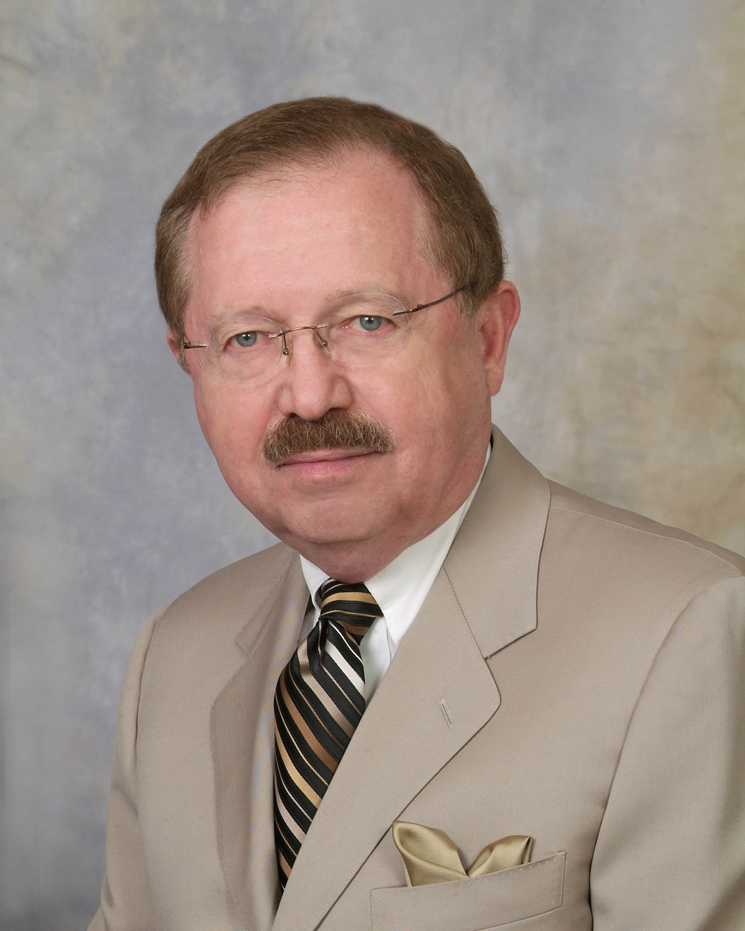 Ron Harvey Headshot tan